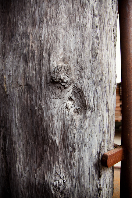 detail - 8' tall petrified specimen on welded iron stand.  Montana